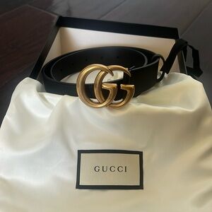 Gold and black leather Gucci GG MARMONT THIN BELT Size 70 cm. Barely worn.